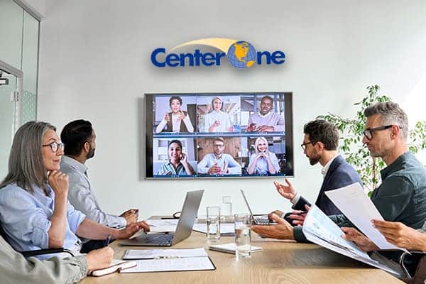 Group of business professionals having a video conference meeting in the office